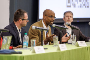 Reggie Williams speaks at 2025 CST Conference on a panel with with Anthea Butler, Ryan Burge, and Gary Adler.