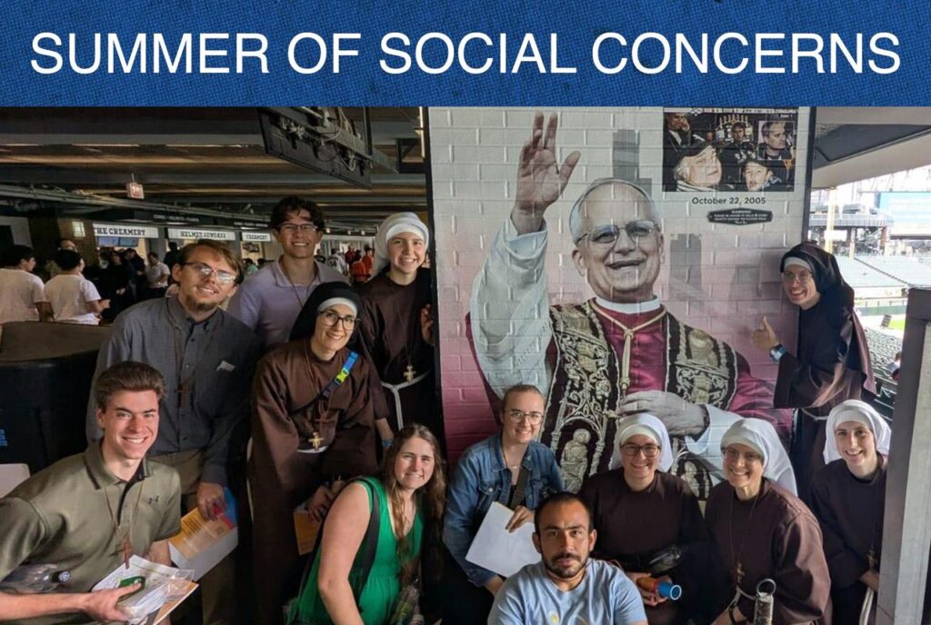 Students with Catholic sisters in Chicago with mural of Pope Leo XIV
