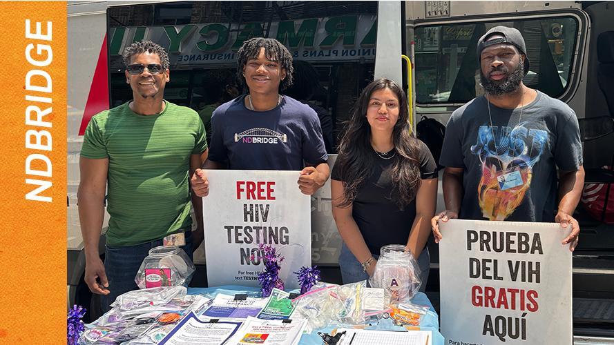 NDBridge student Joshua Jones, second from left, stands with woman and two men at Free HIV testing clinic in NYC