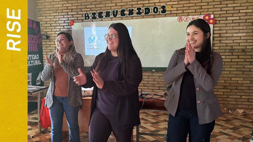 RISE student Cecilia Marmori Soliz, center, with two woman at organization Mujeres Empoderadas