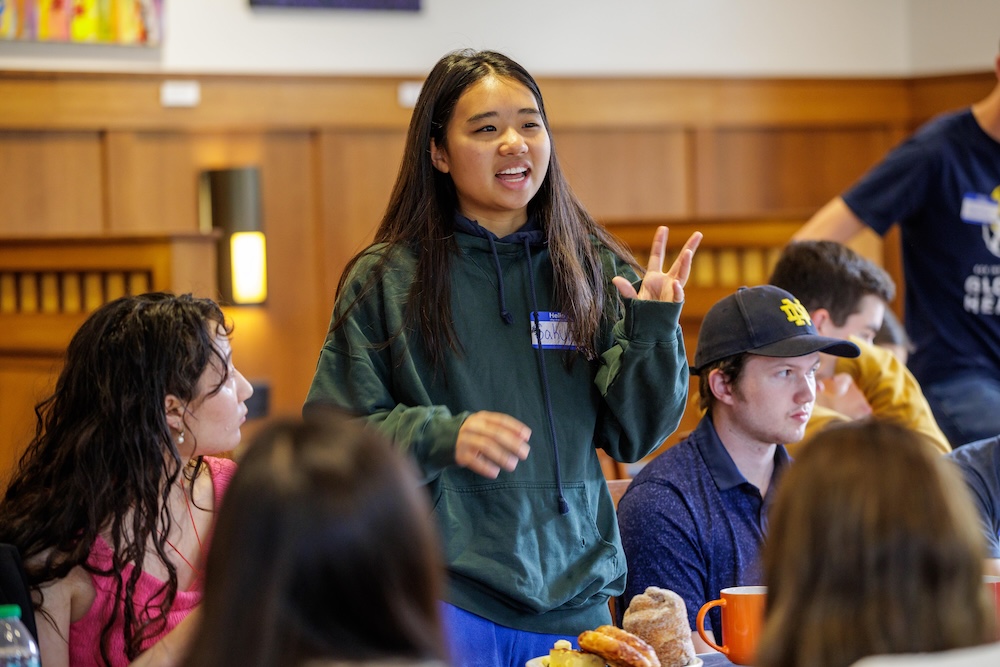 McNeill Common Good Fellow Sakura Yamanaka welcomes new fellows at an orientation breakfast.