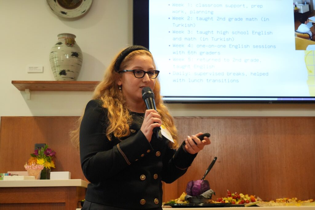 Ada Duru Ak presents her work at the RISE Hometown Symposium in the Geddes Hall Coffee House